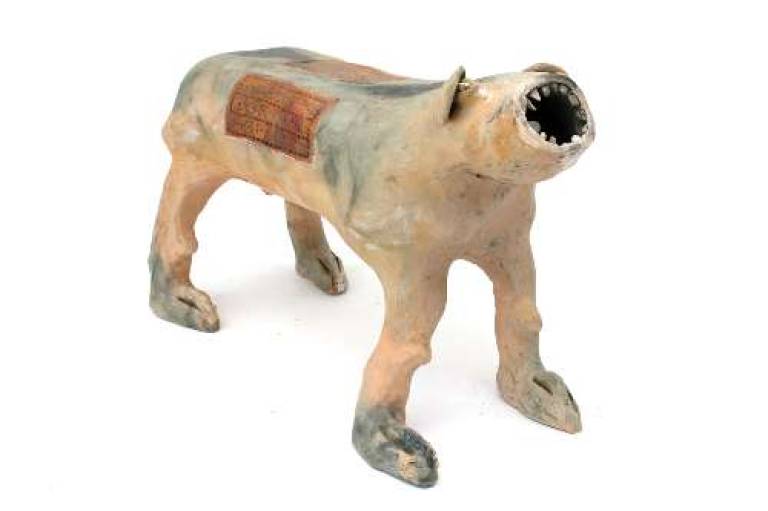 Ochre desert dog with blanket and teeth - Morag MacInnes