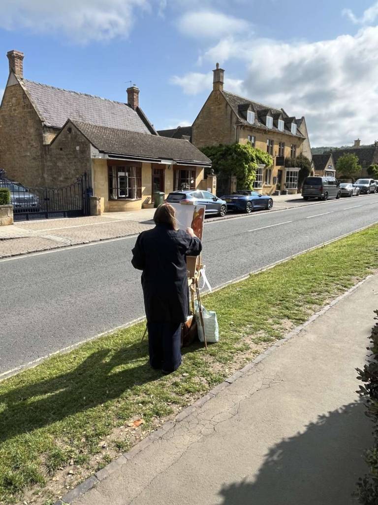 Sally painting in Broadway Worcestershire .The Broadway open painting event. - Sally