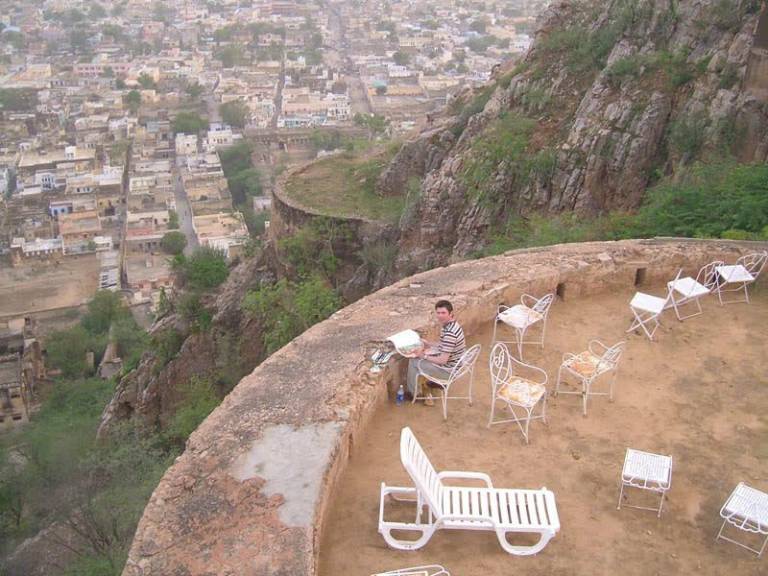 The Artist sketching at kuchamman Fort, Rajasthan, India - Neil Pittaway