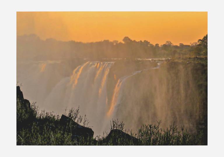 Warm dusk light at Victoria Falls, Zimbabwe - Neil Pittaway