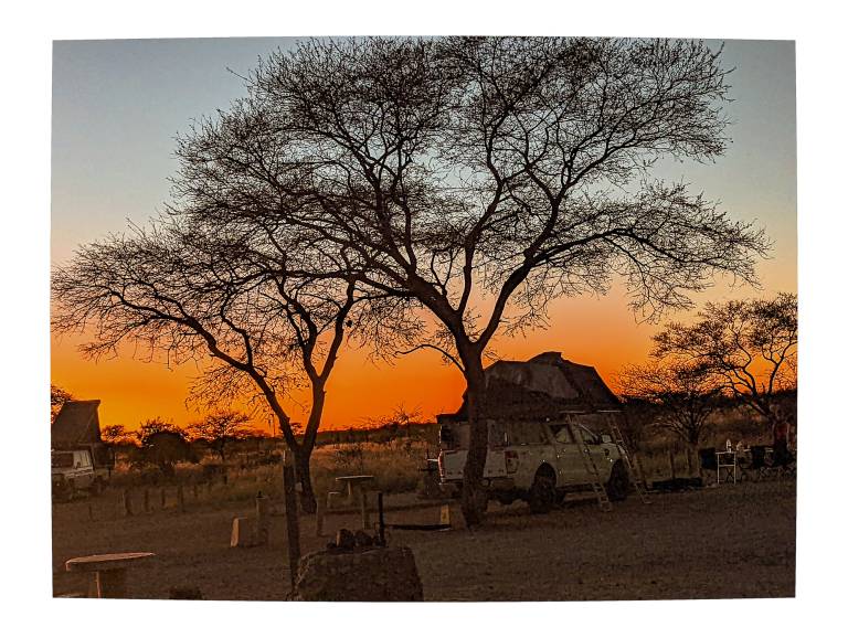 Sunset at Namutoni  Camp, Etosha National Park,  Namibia - Neil Pittaway