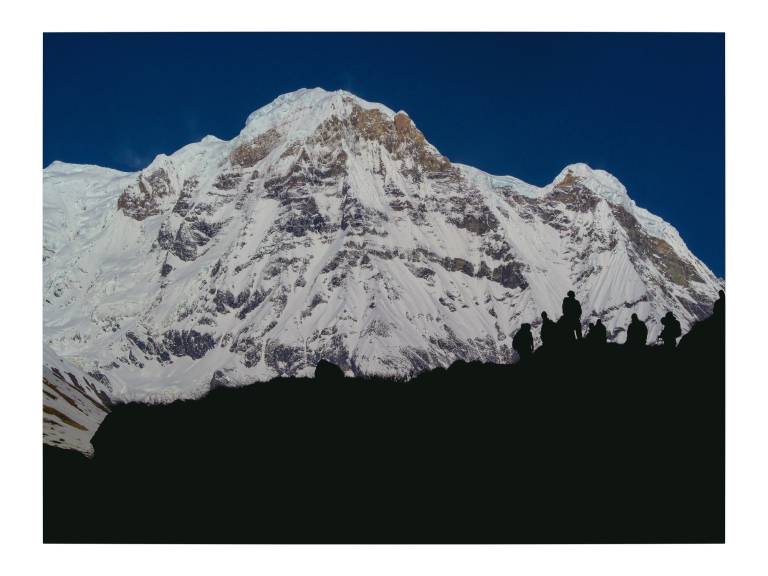 Silhouetted against Annapurna South, Nepal - Neil Pittaway