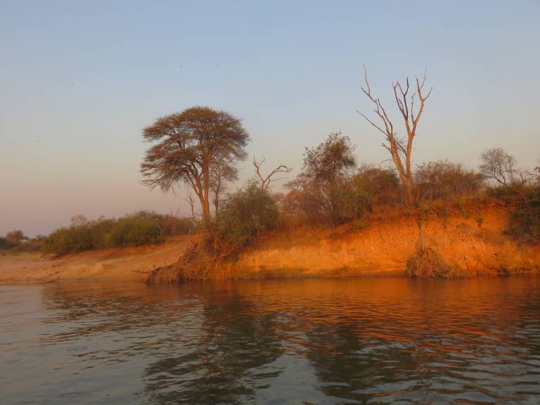 Okavanga River at dusk, Namibia, Africa - Neil Pittaway