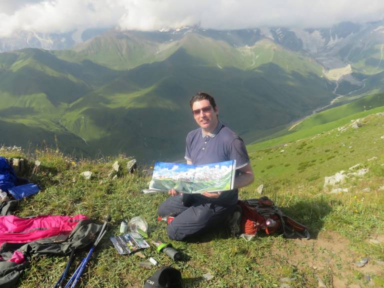 The Artist with his  finished sketch above Ushguli, Georgia - Neil Pittaway