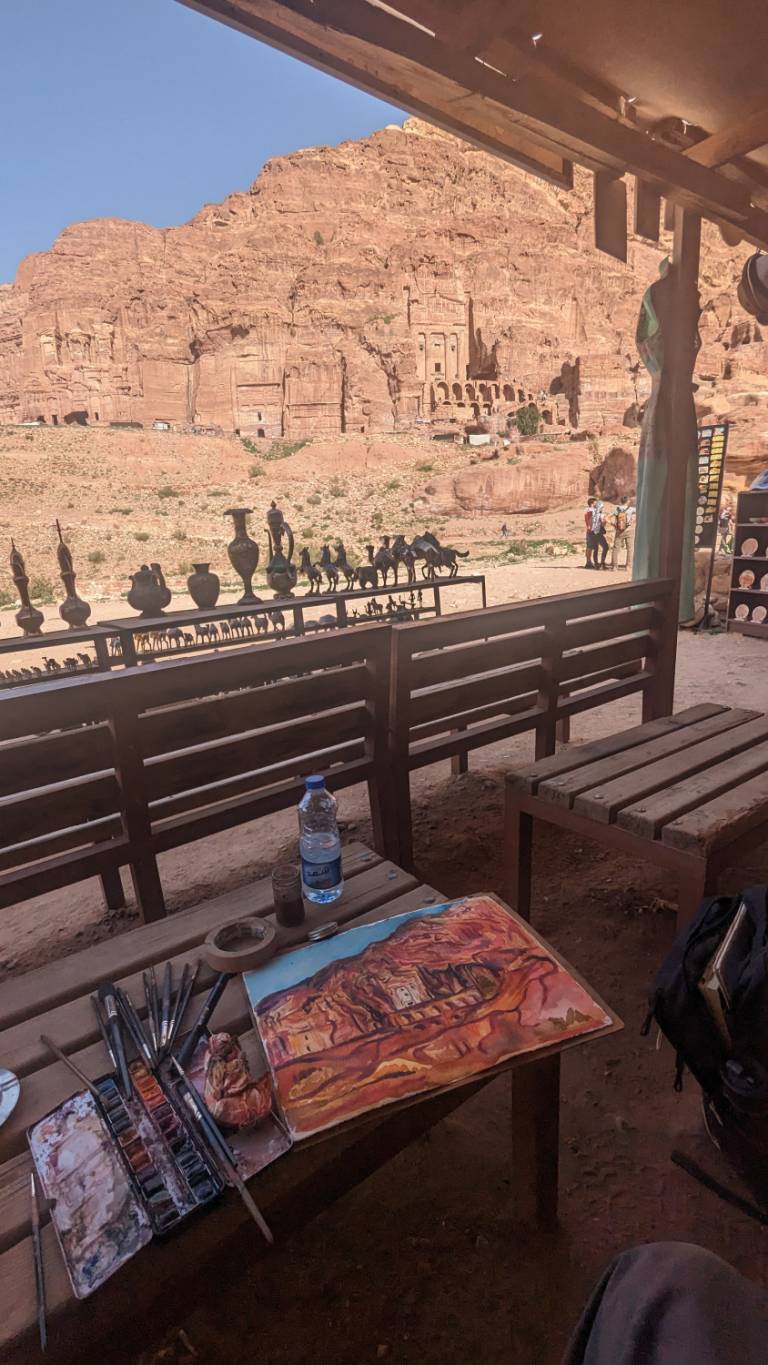 The Artists painting in the location in front of the Royal Tombs in Petra, Jorda - Neil Pittaway