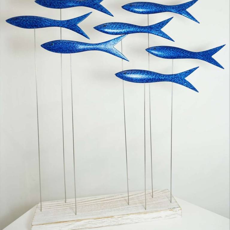 Shoal Of Seven Wee Blue Fish